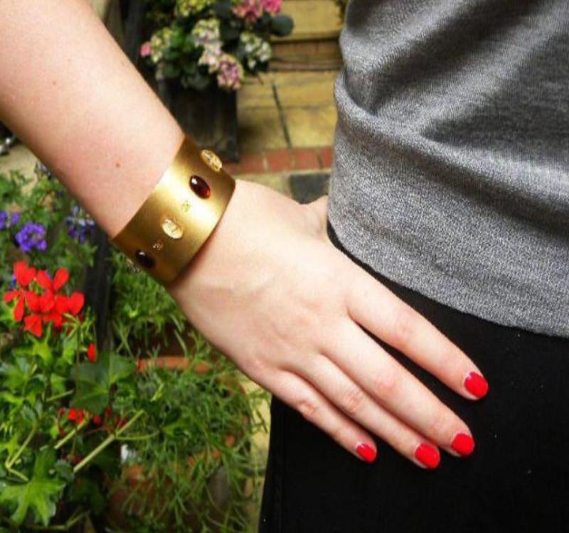 chanel cuff in brushed gold on wrist