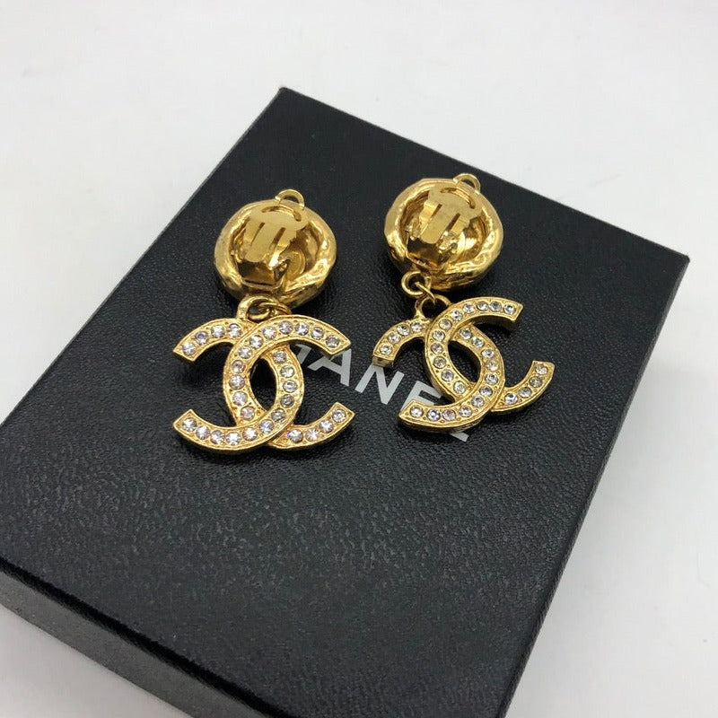 chanel round clip earrings with CC charms