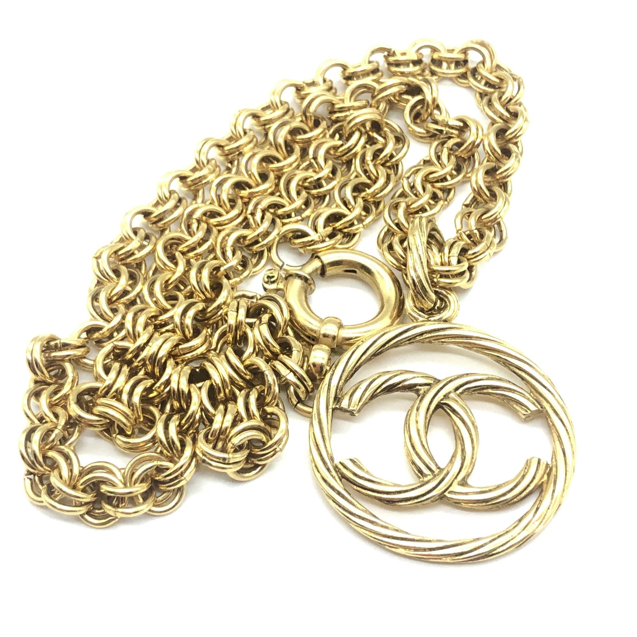 Chanel Vintage Golden Necklace with A Large Cutout Round CC Mark Pendant Top