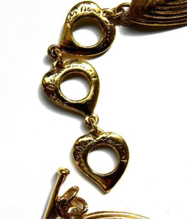 YSL etched oval necklace set clasp